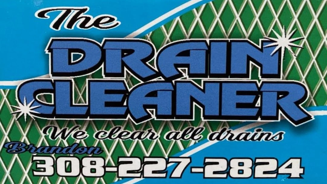 The Drain Cleaner.Drain And Sewer Cleaning. 24/7 Drain Cleaning. Logo