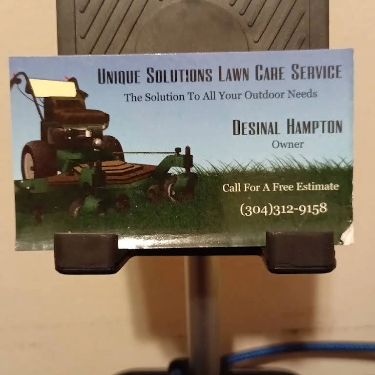 Unique Solutions Lawn Care Service llc Logo