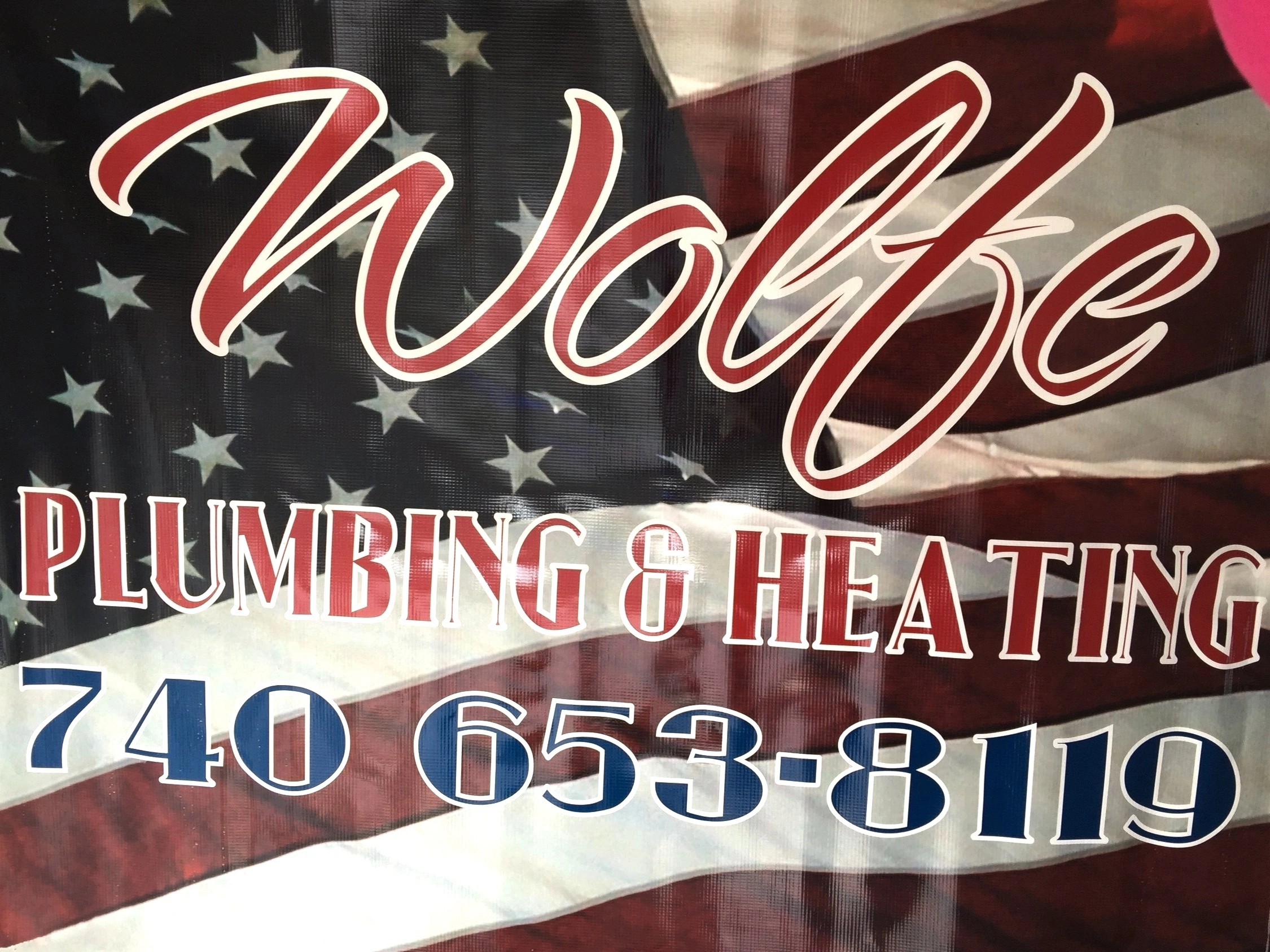 Wolfe Plumbing & Heating Logo